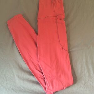 Pink Halara crossover leggings with pockets